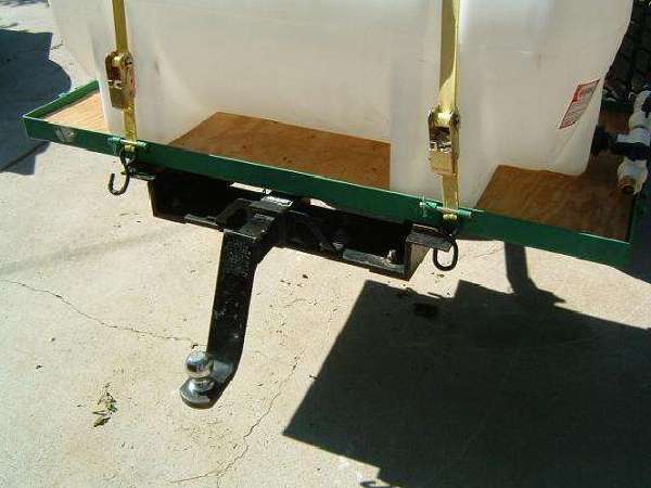 Rear ballast tray with tow hitch