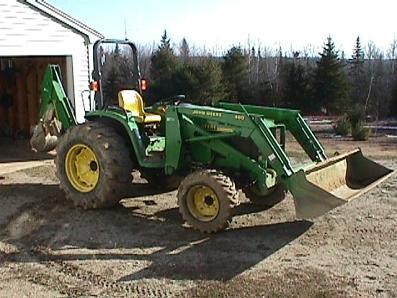 Deere 4700 mfwd Hydro with 460 loader and #48 Backhoe.