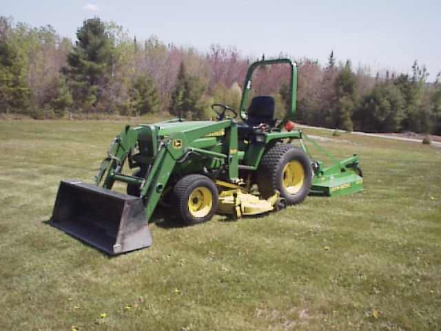 My previous Tractor, JD 755 with # 52 Loader, 262 MMM and 413 bushhog.