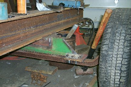 The beam attached to an old axle with some scrap 6 inch  channel.
