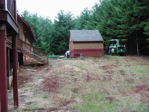 A retaining wall is being built here to keep the shed from sliding down the hill!<br>
