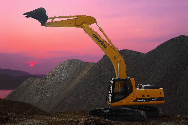 excavator work in sunset 