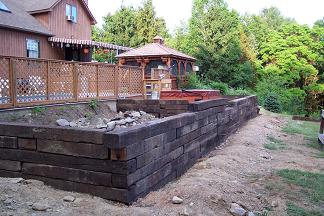 We brought about 60 railroad ties in to create a retaining wall - the 4310 carried the ties from the front of the house to the back for us.