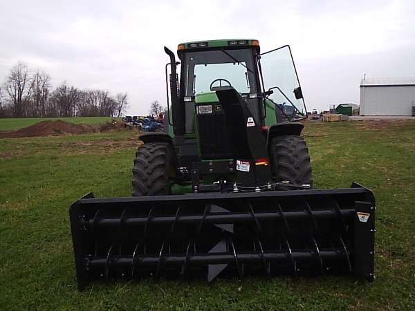 02 John Deere 7810 With a front mount Rear pto driven snow blower