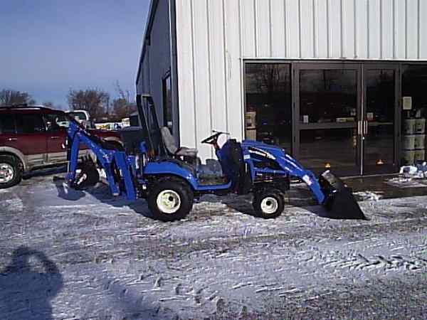 2004 New Holland TZ24DA with a sub fram mounted Woods ground breaker X back hoe and 10 la loader. <br>
