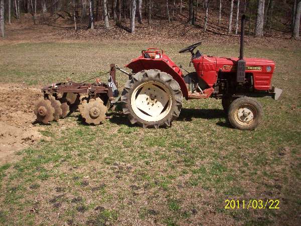 Tractor is really not stout enough make the harrow work properl---might if it was 4X4