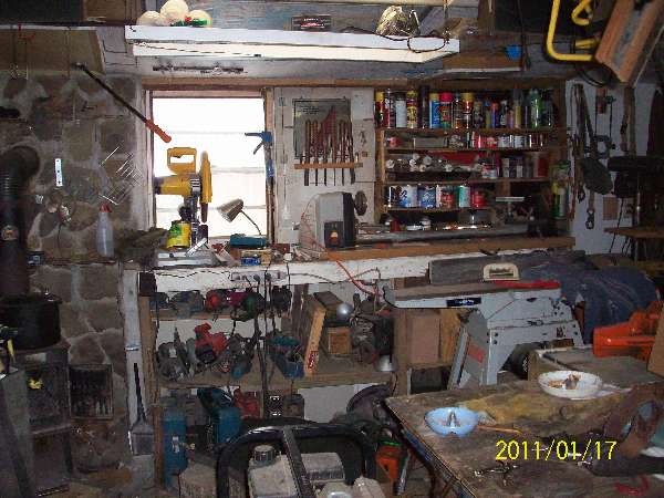18 X 20--FILLED WITH WOODWORKING TOOLS & 3 WELDERS ETC.