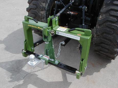 Drawbar mounted 3-point hitch to 2 inch  receiver adapter.  Early design compatible with John Deere iMatch quick-hitch system.